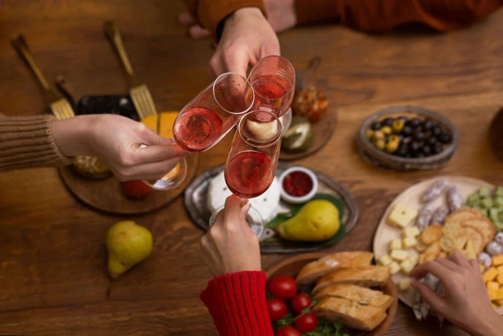 A variety of wine glasses including sparkling, white, and red wine set for different social occasions.